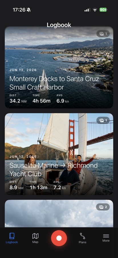 Logbook feed with an aerial trip card and a Golden Gate sailing photo